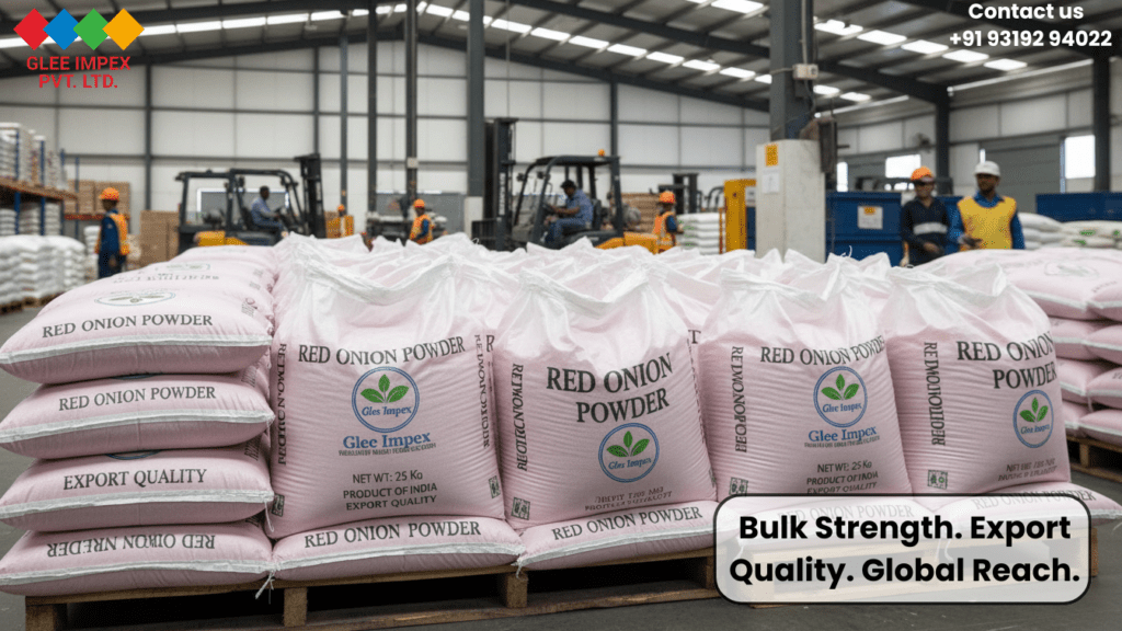 Large warehouse facility filled with 25kg bulk bags of export-quality Red Onion Powder, highlighting a high-capacity Onion Powder exporter in India.